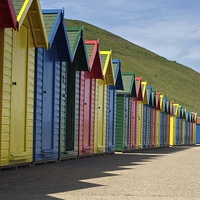 Buy canvas prints of Whitby Beach Huts by Stephen Taylor