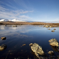 Buy canvas prints of Snow capped mountains on Rannoch Moor by Stephen Taylor