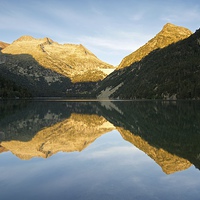 Buy canvas prints of Lac d'Oredon morning reflections by Stephen Taylor