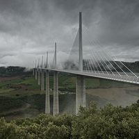 Buy canvas prints of Millau viaduct under the clouds  by Stephen Taylor