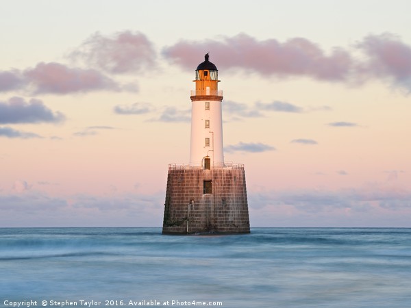 Sunset light at Rattray Head Lighthouse Picture Board by Stephen Taylor