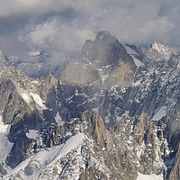 Buy canvas prints of Mist and Light on the Aiguille du Midi by Stephen Taylor