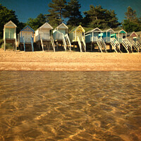 Buy canvas prints of Beach Huts from the water at Wells-next-the-sea by Sally Lloyd