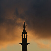 Buy canvas prints of Sunset at the Britannia Lord Nelson Monument in Great Yarmouth Norfolk by Sally Lloyd