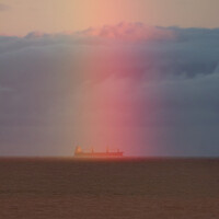 Buy canvas prints of Rainbow ship on the North Sea by Sally Lloyd