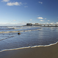 Buy canvas prints of Cromer pier from the beach by Sally Lloyd