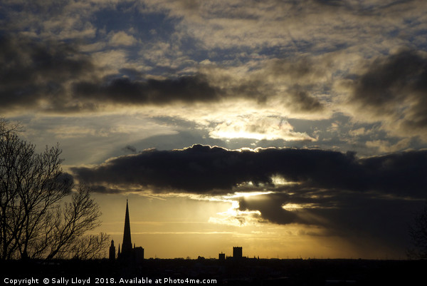 Dramatic sky over Norwich Cathedral Picture Board by Sally Lloyd