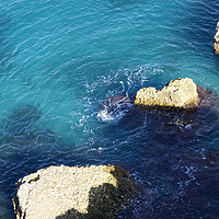 Buy canvas prints of Turquoise sea at Nerja, Spain by Sally Lloyd