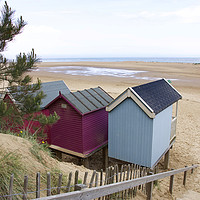 Buy canvas prints of Pink and Blue Beach huts at Wells-next-the-Sea by Sally Lloyd