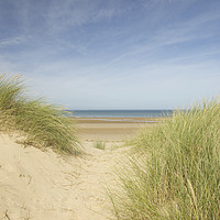 Buy canvas prints of Through the dunes at Holkham beach by Sally Lloyd
