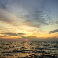 Buy canvas prints of Sunset sea Norfolk coast by Sally Lloyd