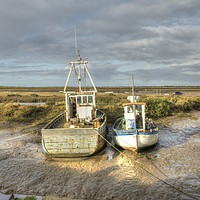 Buy canvas prints of Low tide boats at Brancaster by Sally Lloyd