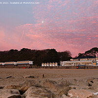 Buy canvas prints of A Colourful Sunrise at Branksome Chine Beach by paul cobb