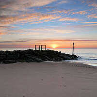 Buy canvas prints of A Serene Winter Sunrise at Branksome Chine Beach by paul cobb