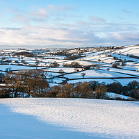 Buy canvas prints of Devon's Snowy Patchwork by Dave Rowlatt