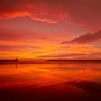 Buy canvas prints of  Roker sunrise by Jim Doneathy