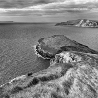 Buy canvas prints of  Worbarrow Tout in mono.  by Mark Godden