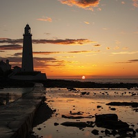 Buy canvas prints of  St. Mary's Lighthouse Sunrise by Alex Murray