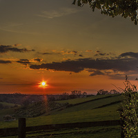 Buy canvas prints of  A beautiful sunset over the Surrey hills by Fabrizio Malisan