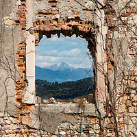 Buy canvas prints of Window Frame Towards The Mountains by Fabrizio Malisan