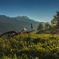 Buy canvas prints of Evening comes, bike's tired ..let's enjoy the suns by Fabrizio Malisan