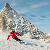 Buy canvas prints of Skiing by the Matterhorn Mountain in Zermatt by Fabrizio Malisan