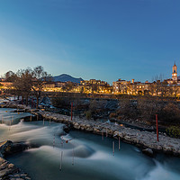 Buy canvas prints of An evening in Ivrea Piemonte Italy River Canoe by Fabrizio Malisan