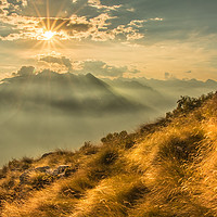 Buy canvas prints of The Sun Sets Over The Mountains by Fabrizio Malisan