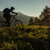 Buy canvas prints of Mountain Biker at Sunset  by Fabrizio Malisan