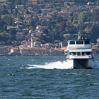 Buy canvas prints of Ferry boat in Bellagio Lake Como by Fabrizio Malisan