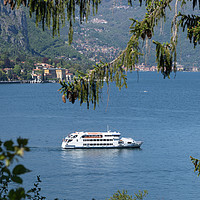 Buy canvas prints of Boat in frame at Lake Como Italy by Fabrizio Malisan