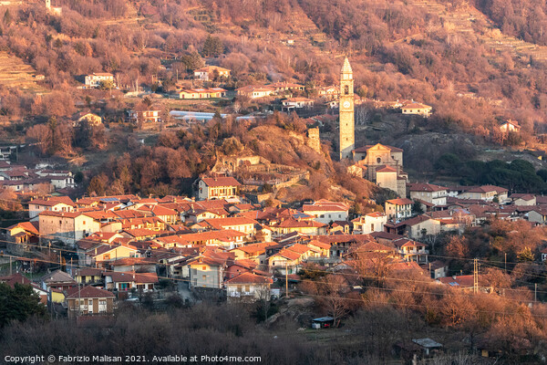 Afternoon sunlight over the village town and church of Chiaverano Picture Board by Fabrizio Malisan