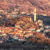 Buy canvas prints of Afternoon sunlight over the village town and church of Chiaverano by Fabrizio Malisan