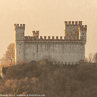 Buy canvas prints of Sunset light over the Castle of Montalto Dora in Piedmont Italy by Fabrizio Malisan