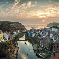 Buy canvas prints of  Staithes, Village, at Sunrise, by David Hirst