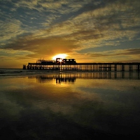 Buy canvas prints of  The Pier by Tim Clifton
