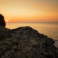 Buy canvas prints of Rocky Sunset by tom downing
