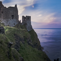 Buy canvas prints of Dunluce Castle Ruins, Causeway Coast, Northern Ire by Alan Campbell