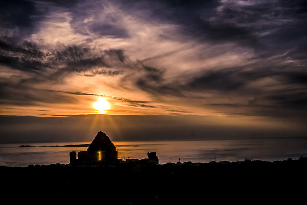 Sunset over Dunluce Castle Window, Northern Irelan Picture Board by Alan Campbell