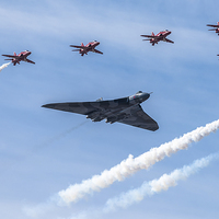 Buy canvas prints of  Vulcan Bomber and Red Arrows by Chris Hulme