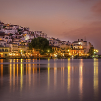 Buy canvas prints of Skopelos Harbour by Night by David Bradbury
