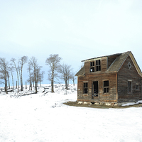 Buy canvas prints of  Winter Farmhouse by Brian Ewing