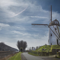 Buy canvas prints of  Windmill at Damme, Belgium by Rose Atkinson
