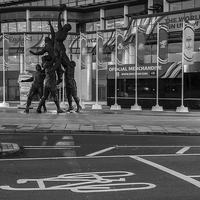 Buy canvas prints of  Rugby world cup stadium bronze sculpture by mike cooper