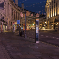 Buy canvas prints of  Regent street Christmas lights by mike cooper