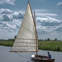 Buy canvas prints of  A Man and His Boat as one.  by Philip Hodges aFIAP ,