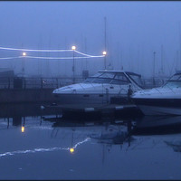 Buy canvas prints of "FOGGY REFLECTIONS AT THE MARINA" by ROS RIDLEY