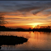 Buy canvas prints of "Sunset across the lake" by ROS RIDLEY