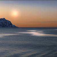 Buy canvas prints of "Sun setting over an Arctic sea" by ROS RIDLEY