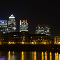 Buy canvas prints of  Canary Wharf from Wapping by Ian Danbury